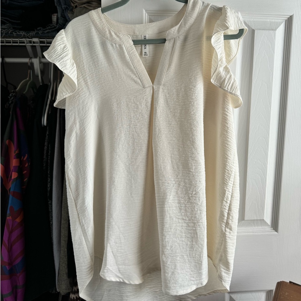 NWOT zenana off white satiny sleeveless ruffle shoulder blouse